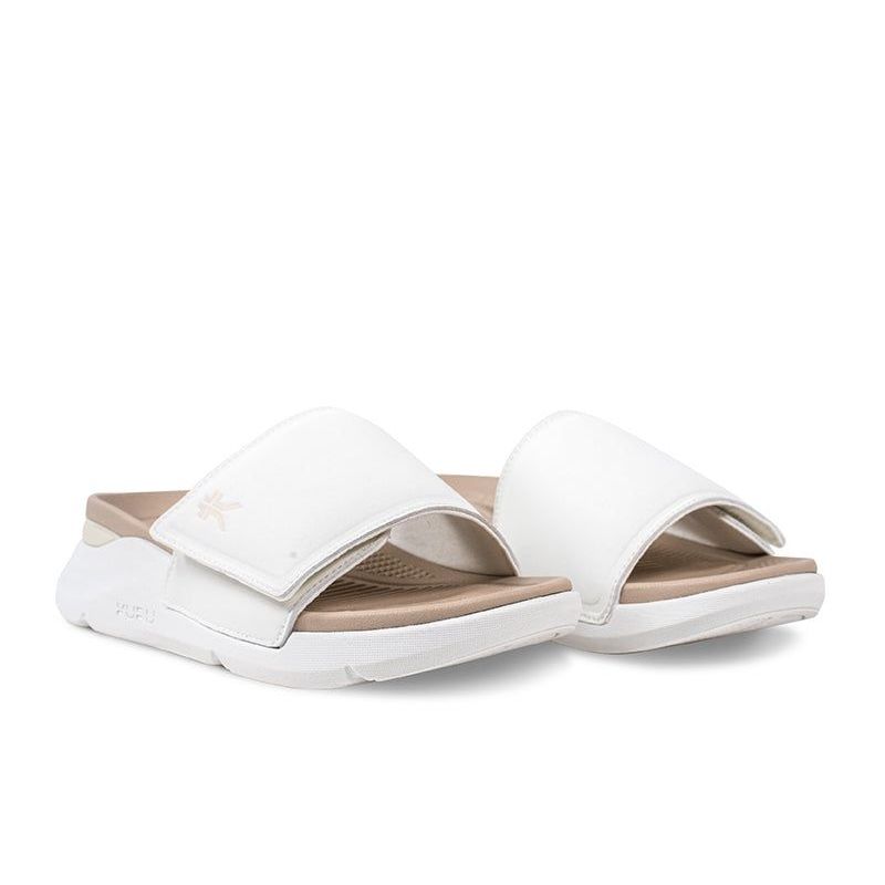 Pair of KURU MOMENT Women's Sandal in Bright White-Sand, angled view.
