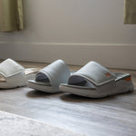 Person wearing the KURU MOMENT Women's Sandal.