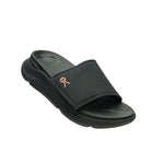 Outsole view of the KURU MOMENT Women's Sandal in Jet Black-Peach Sherbet, showing the KURUSOLE tread.