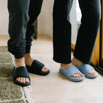 Person wearing the KURU MOMENT Women's Sandal.