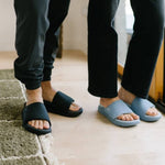 Person wearing the KURU MOMENT Men's Sandal.