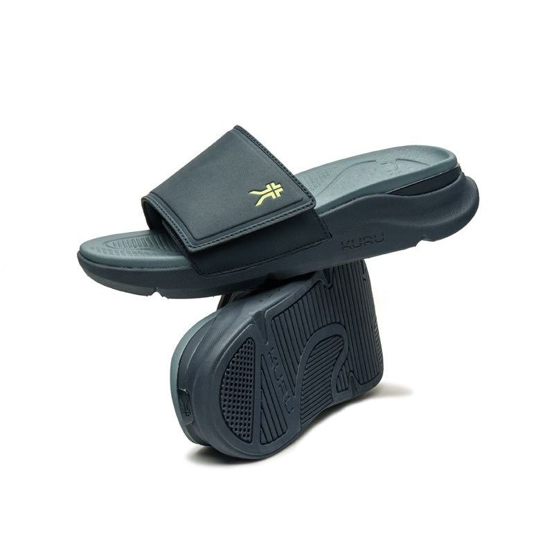 Outsole view of the KURU MOMENT Men's Sandal in Midnight Blue-Pale Lime, showing the KURUSOLE tread.