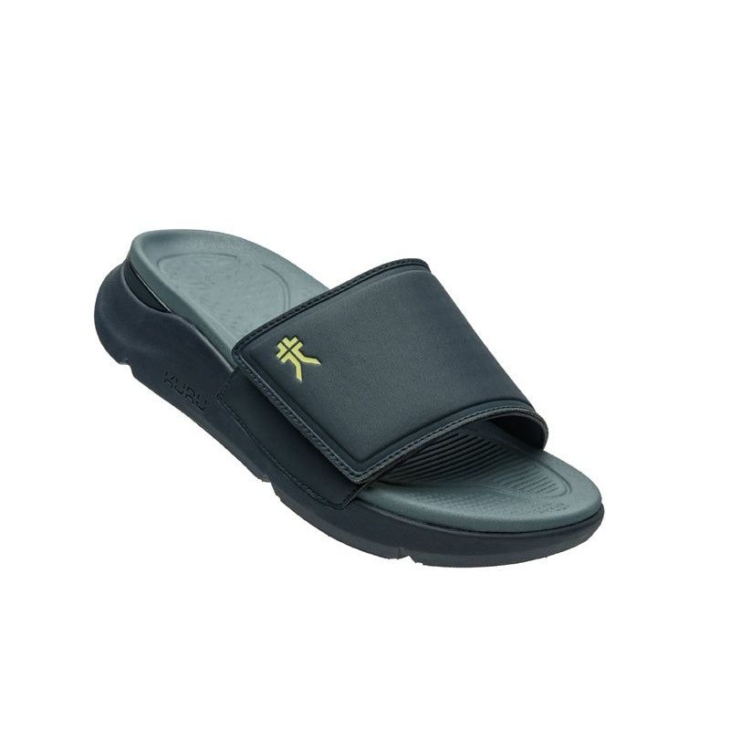 Angled profile view of the KURU MOMENT Men's Sandal in Midnight Blue-Pale Lime.