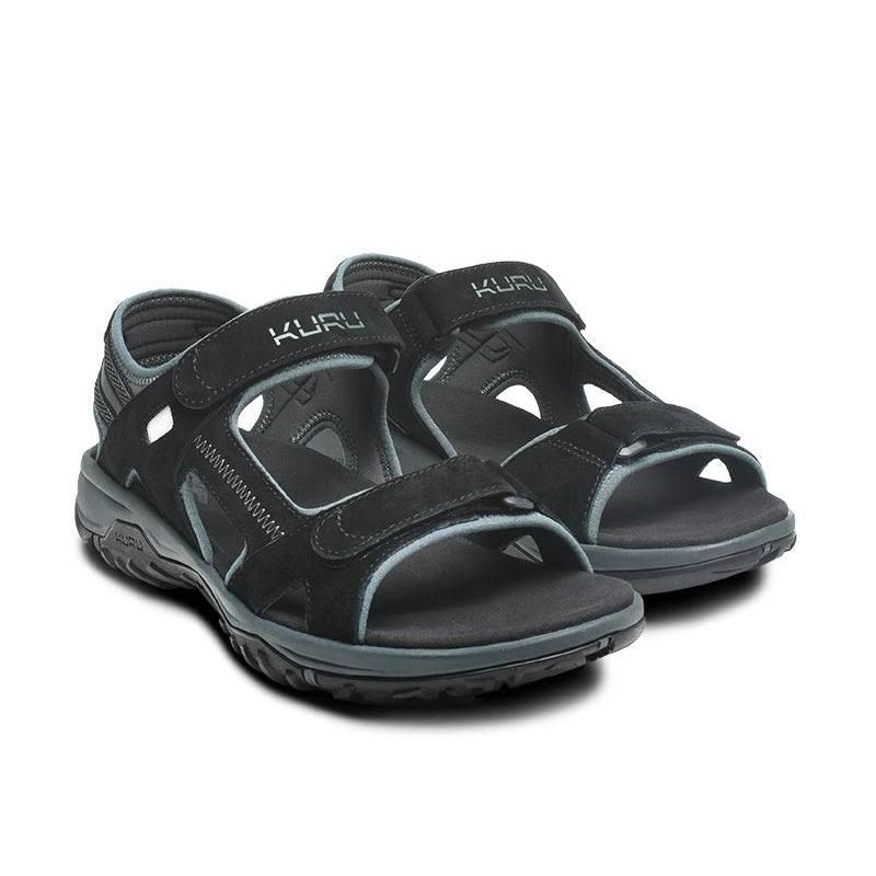 Pair of KURU TREAD Men's Sandal in Jet Black-Empire Steel, angled view.