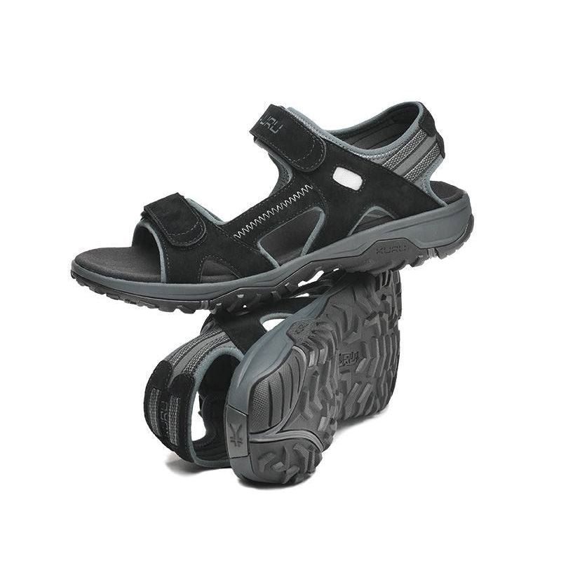 Pair of KURU TREAD Men's Sandal in Jet Black-Empire Steel, angled view.