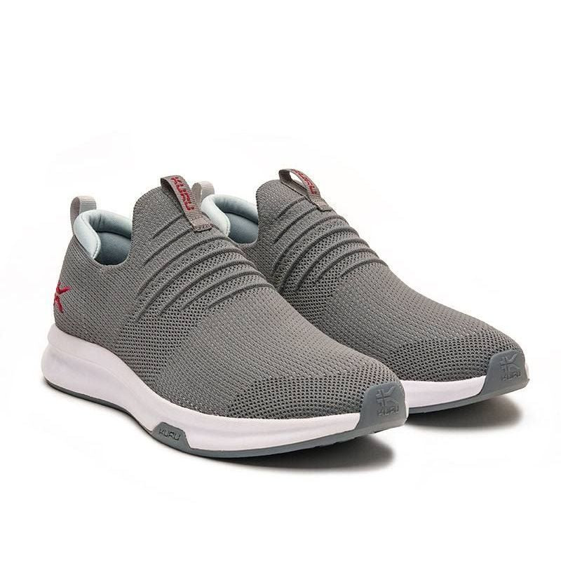 Pair of KURU ATOM Slip-On Men's Slip-On Sneaker in Cloud Gray-Cardinal Red, angled view.