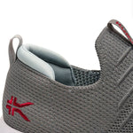 Close-up of the upper material on the KURU ATOM Slip-On Men's Slip-On Sneaker in Cloud Gray-Cardinal Red.