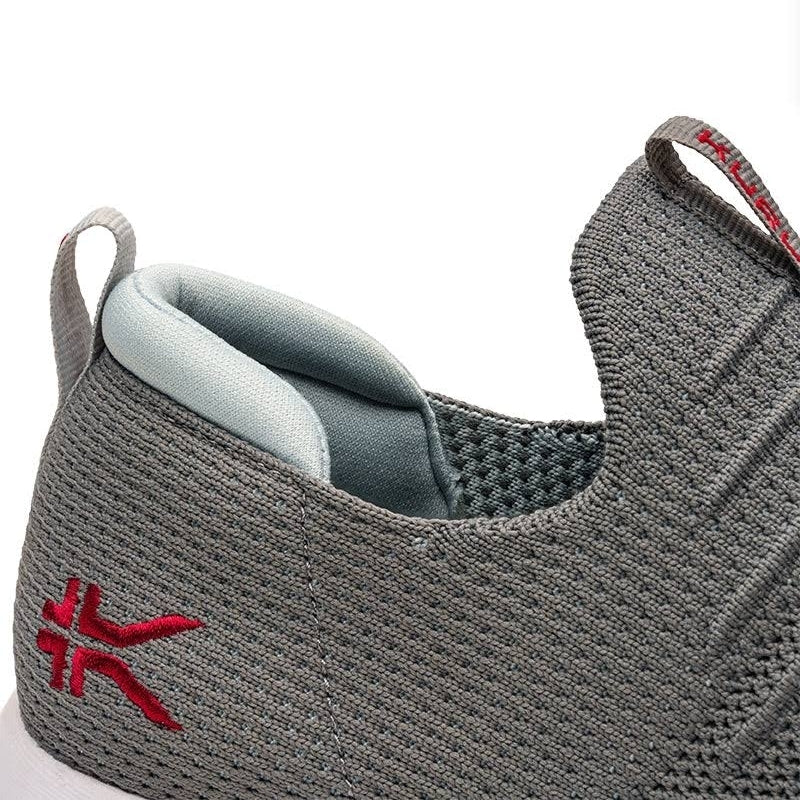 Close-up of the upper material on the KURU ATOM Slip-On Men's Slip-On Sneaker in Cloud Gray-Cardinal Red.