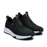 Pair of KURU ATOM Slip-On Women's Slip-On Sneaker in Jet Black, angled view.