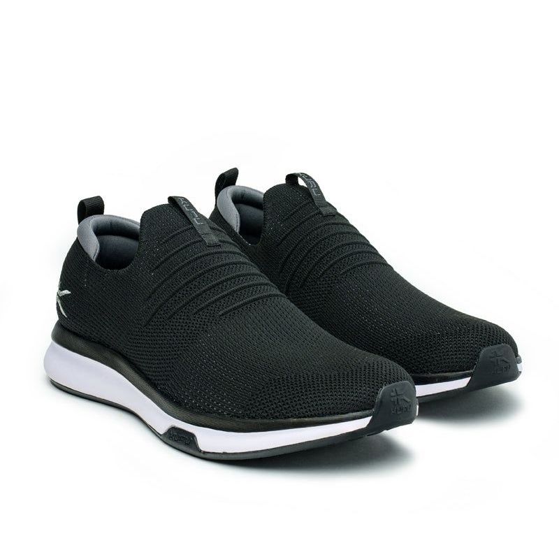 Pair of KURU ATOM Slip-On Men's Slip-On Sneaker in Jet Black-Slate Gray, angled view.