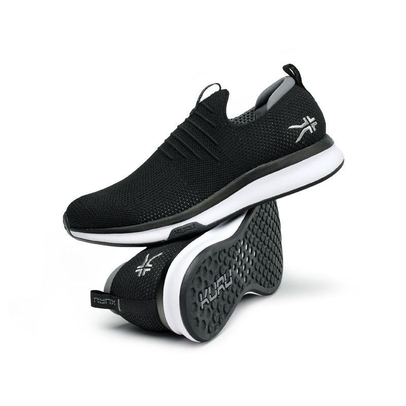 Pair of KURU ATOM Slip-On Men's Slip-On Sneaker in Jet Black-Slate Gray, angled view.