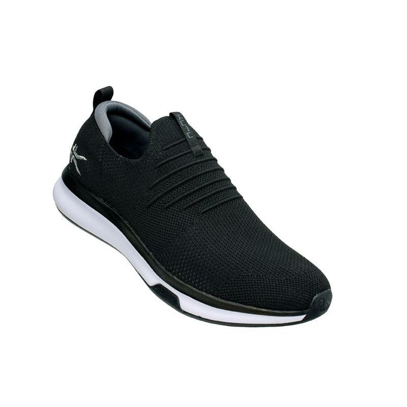 Angled profile view of the KURU ATOM Slip-On Men's Slip-On Sneaker in Jet Black-Slate Gray.