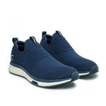 Pair of KURU ATOM Slip-On Men's Slip-On Sneaker in Midnight Blue-Mineral Blue, angled view.