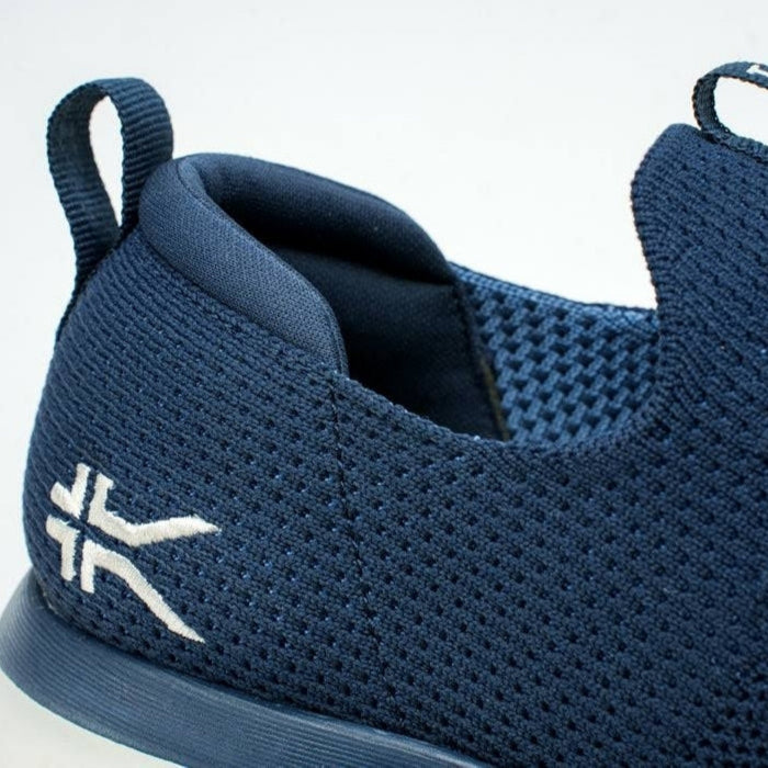 Close-up of the upper material on the KURU ATOM Slip-On Men's Slip-On Sneaker in Midnight Blue-Mineral Blue.