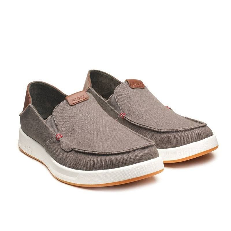 Pair of KURU PACE Men's Slip-On Sneaker in Dark Ash-White-Rich Walnut, angled view.