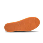 Outsole view of the KURU PACE Men's Slip-On Sneaker in Dark Ash-White-Rich Walnut, showing the KURUSOLE tread.