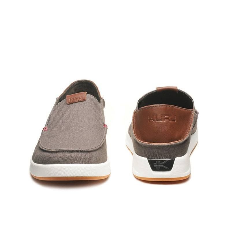 Back heel view of the KURU PACE Men's Slip-On Sneaker in Dark Ash-White-Rich Walnut.