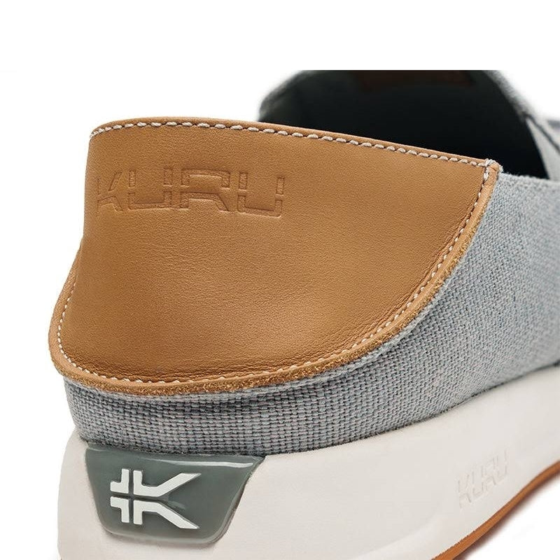 Close-up of the upper material on the KURU PACE Men's Slip-On Sneaker in Lead Gray-Cedar Brown.