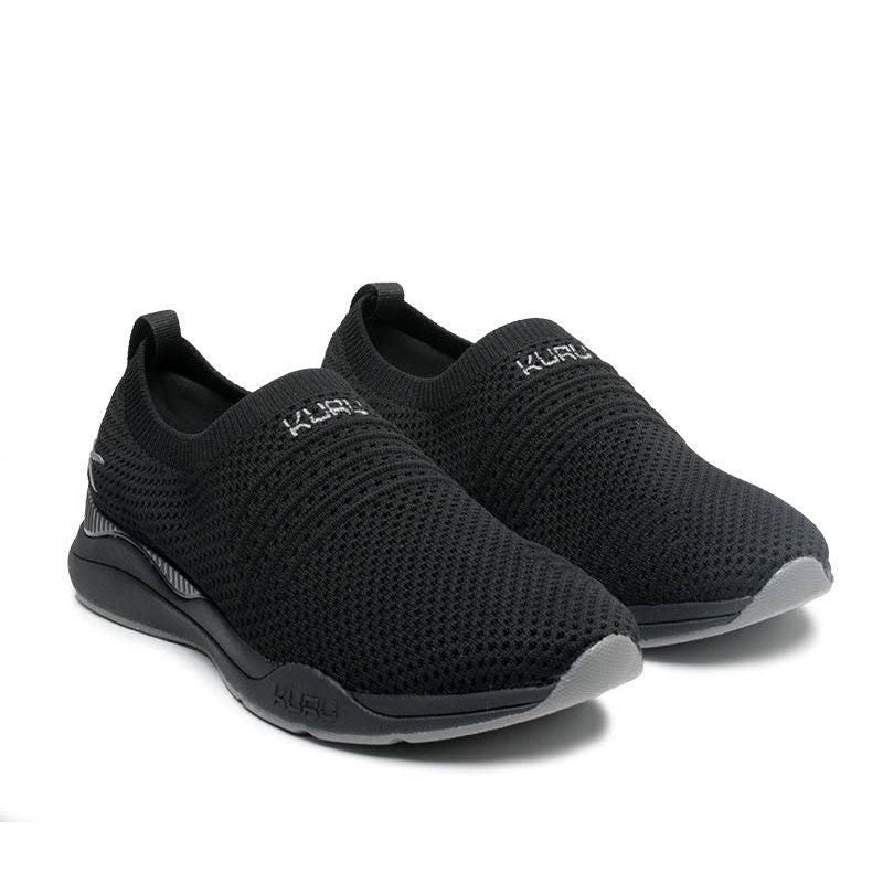 Pair of KURU STRIDE Women's Slip-On Sneaker in Jet Black-Slate Gray, angled view.