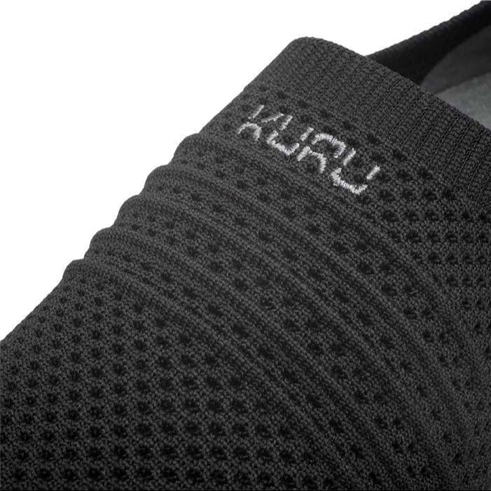 Pair of KURU STRIDE Women's Slip-On Sneaker in Jet Black-Slate Gray, angled view.