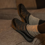 Angled profile view of the KURU DRAFT 2 Women's Slipper in Charcoal Gray-Jet Black.
