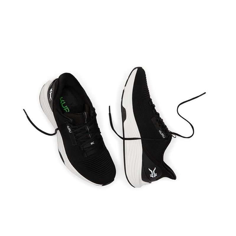 Outsole view of the KURU ATOM 2 Men's Sneaker in Jet Black-Bright White, showing the KURUSOLE tread.