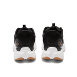 Back heel view of the KURU ATOM 2 Women's Sneaker in Jet Black-Desert Tan.