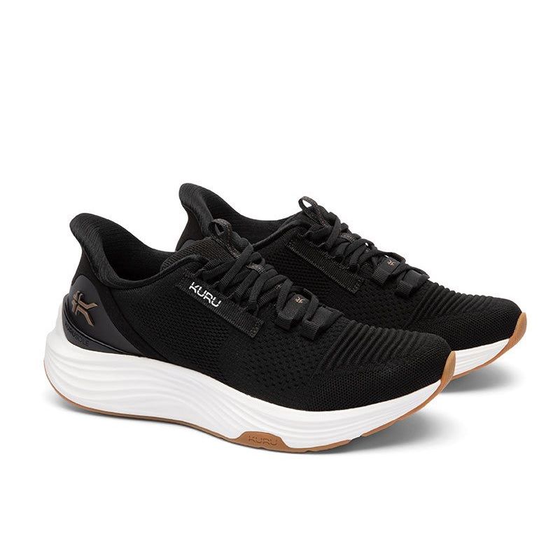Pair of KURU ATOM 2 Women's Sneaker in Jet Black-Desert Tan, angled view.