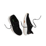 Outsole view of the KURU ATOM 2 Women's Sneaker in Jet Black-Desert Tan, showing the KURUSOLE tread.