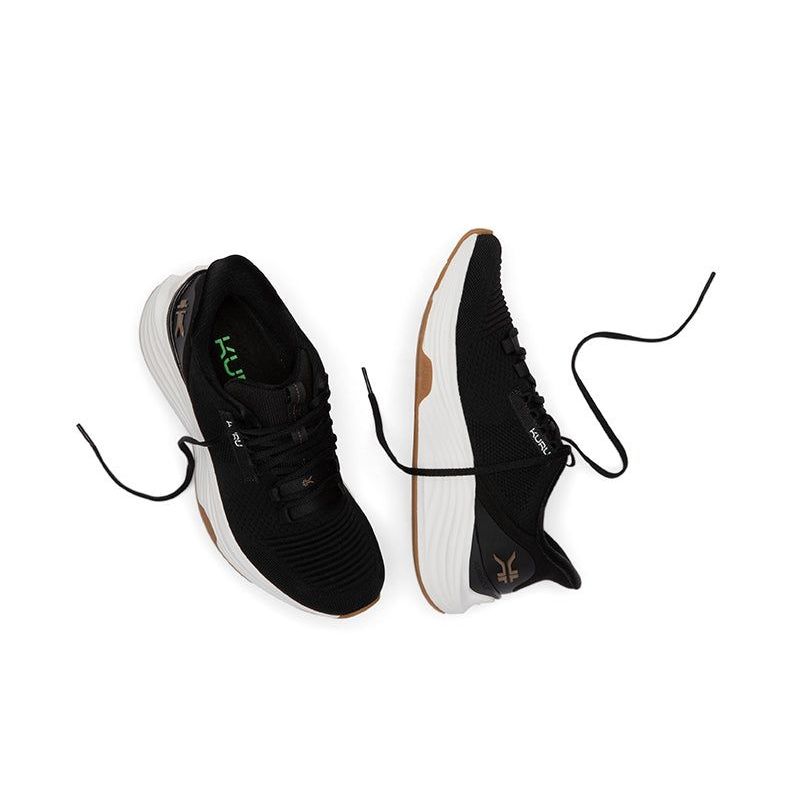 Outsole view of the KURU ATOM 2 Women's Sneaker in Jet Black-Desert Tan, showing the KURUSOLE tread.