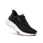 Angled profile view of the KURU ATOM 2 WIDE Women's Sneaker in Jet Black-Desert Tan.