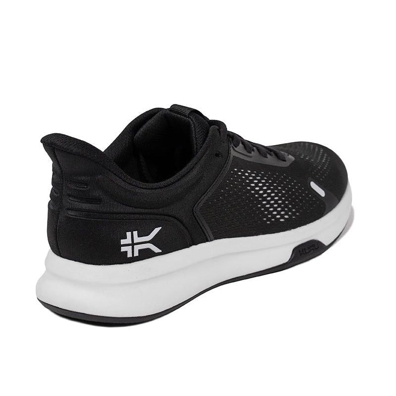 Back heel view of the KURU ATOM Fusion Women's Sneaker in Jet Black-Bright White.