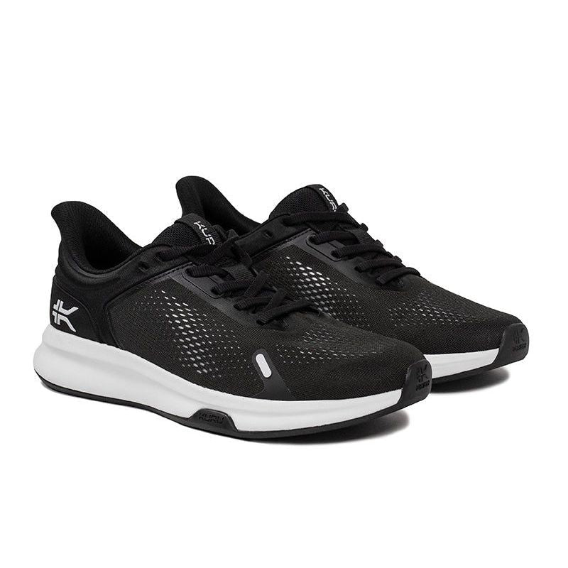 Pair of KURU ATOM Fusion Women's Sneaker in Jet Black-Bright White, angled view.