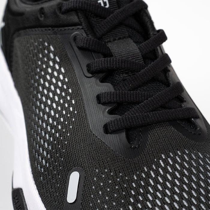 Pair of KURU ATOM Fusion Men's Sneaker in Jet Black-Bright White, angled view.