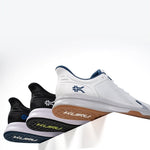 Angled profile view of the KURU ATOM Fusion Men's Sneaker in Midnight Blue-Jet Black.