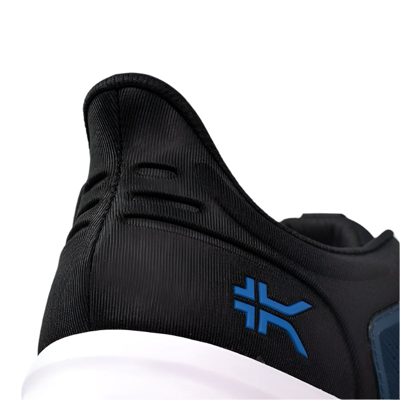 Outsole view of the KURU ATOM Fusion Men's Sneaker in Midnight Blue-Jet Black, showing the KURUSOLE tread.