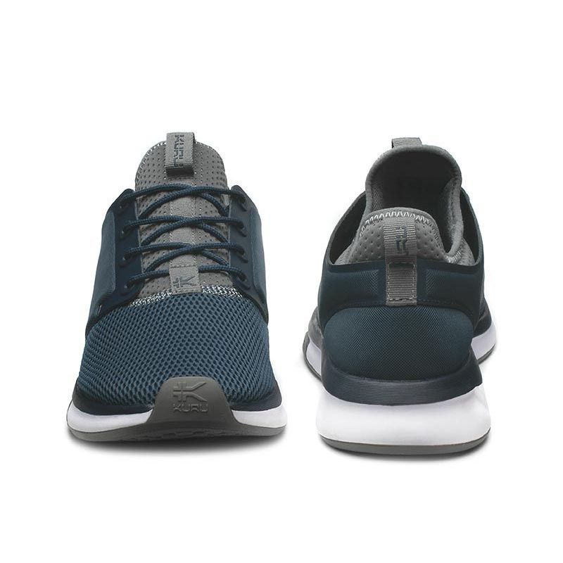 Back heel view of the KURU ATOM Men's Sneaker in Indigo-White-Basalt.