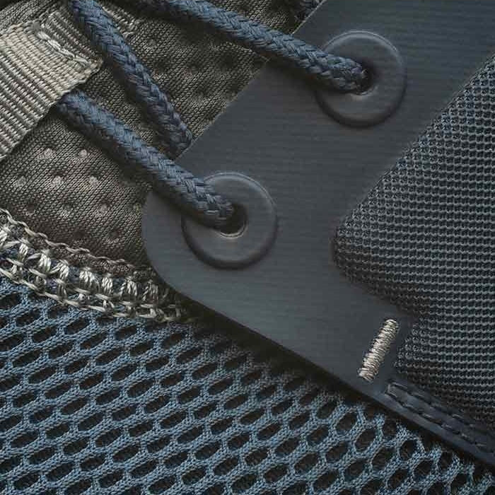 Pair of KURU ATOM Men's Sneaker in Indigo-White-Basalt, angled view.