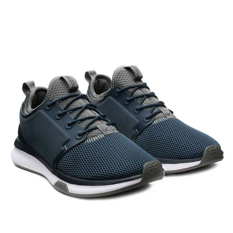Pair of KURU ATOM Men's Sneaker in Indigo-White-Basalt, angled view.