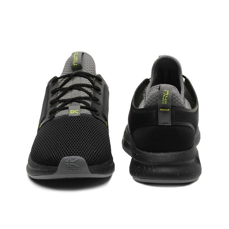Back heel view of the KURU ATOM Men's Sneaker in Jet Black-Citron.