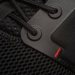 Pair of KURU ATOM Men's Sneaker in Jet Black-White-Fire Red, angled view.