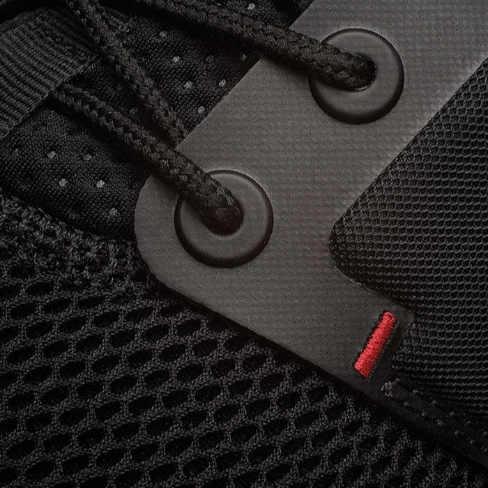 Pair of KURU ATOM Men's Sneaker in Jet Black-White-Fire Red, angled view.
