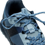 Close-up of the upper material on the KURU ATOM Trail Women's Sneaker in Blue Fog-Midnight Blue.