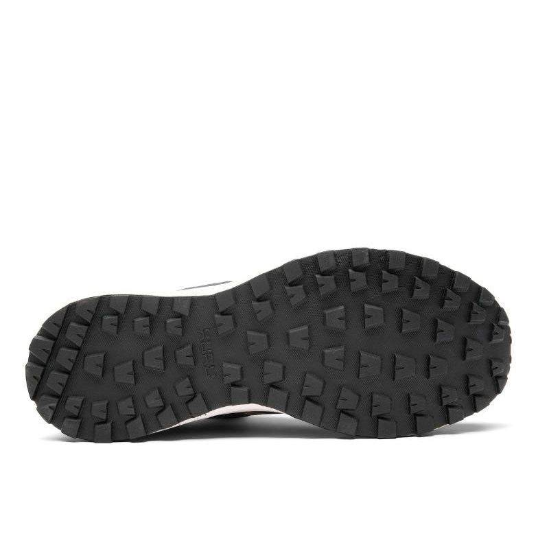 Outsole view of the KURU ATOM Trail Men's Sneaker in Rustic Taupe-Jet Black, showing the KURUSOLE tread.