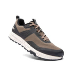 Angled profile view of the KURU ATOM Trail Men's Sneaker in Rustic Taupe-Jet Black.