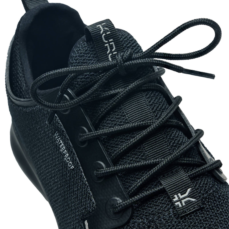Close-up of the upper material on the KURU ATOM Waterproof Men's Sneaker in Jet Black.