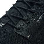 Pair of KURU ATOM Waterproof Women's Sneaker in Jet Black, angled view.