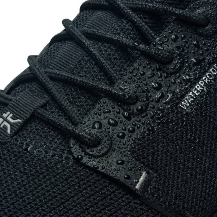 Pair of KURU ATOM Waterproof Women's Sneaker in Jet Black, angled view.