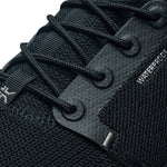 Pair of KURU ATOM Waterproof Men's Sneaker in Jet Black, angled view.
