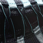 Pair of KURU CHICANE Women's Sneaker in Black-Delirium, angled view.
